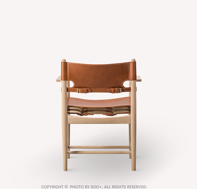 The Spanish Dining Chair With Armrests in Soaped Oak and Cognac Saddle Leather