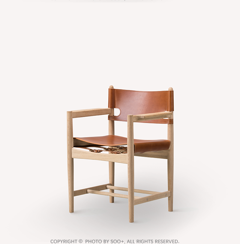 The Spanish Dining Chair With Armrests in Soaped Oak and Cognac Saddle Leather